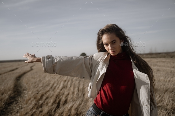 a girl in a red turtleneck asks to stop transport