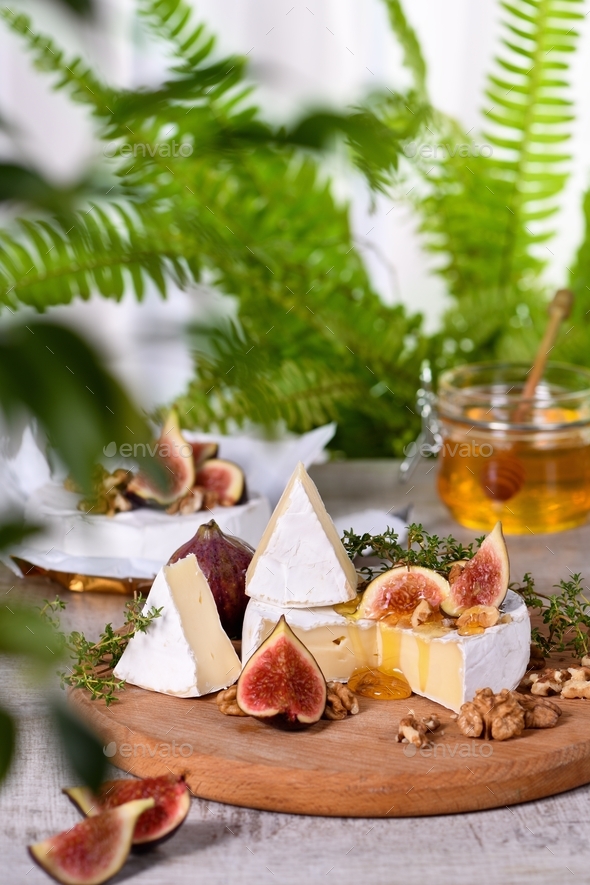 Brie cheese with honey and figs Stock Photo by Apolonia PhotoDune