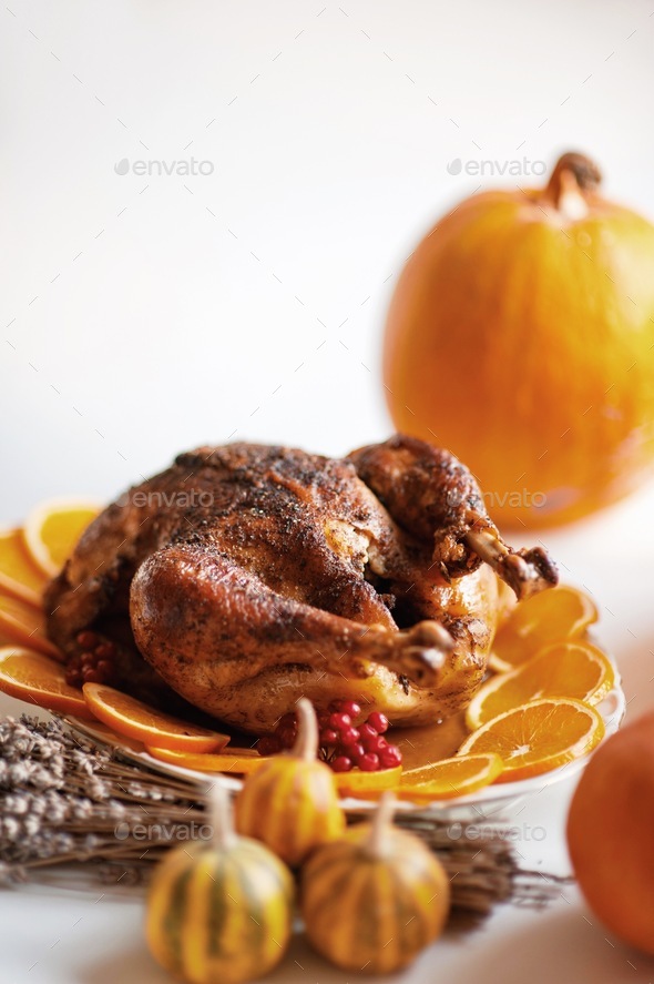 Delicious golden roasted Thanksgiving turkey on dinner table with ...
