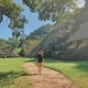 Boy walking on a path to a mayan ruin - PhotoDune Item for Sale