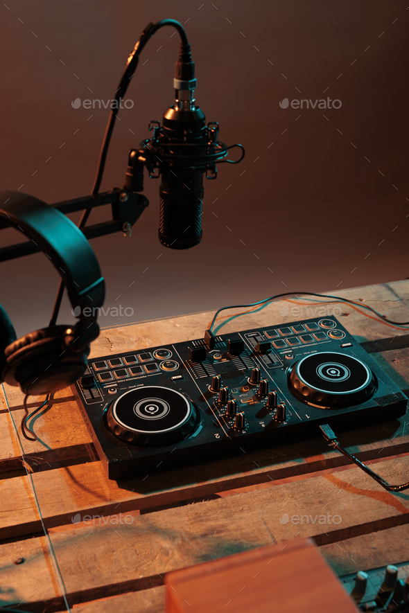 Musical production table with dj turntables and equipment