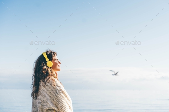 Woman listening music. - Stock Photo - Images