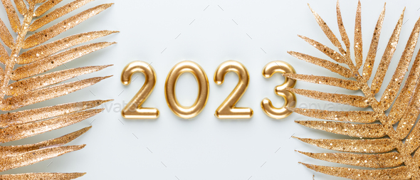 Happy New Year 2023 poster. Christmas background with gold 2023 numbers.  Stock Photo by GitaKulinica