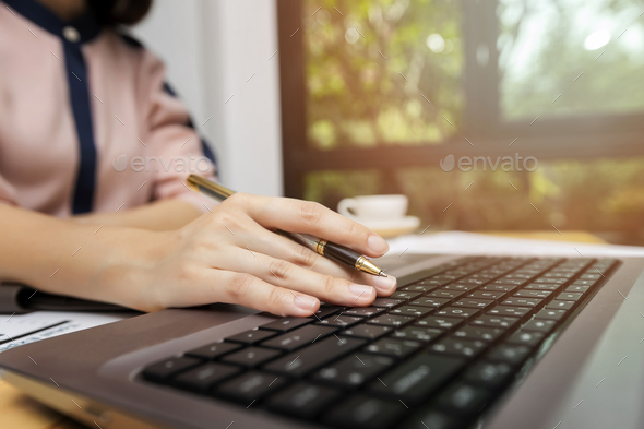 Woman using laptop for searching web or  browsing information. - Stock Photo - Images