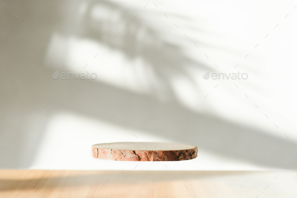 Levitating flying podium with shadows on background. Abstract podium for organic cosmetic products.  - Stock Photo - Images