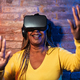 Senior African woman having fun with futuristic virtual reality goggles - PhotoDune Item for Sale