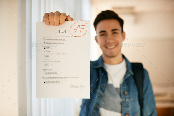 Close-up of student getting A grade on a test in high school.