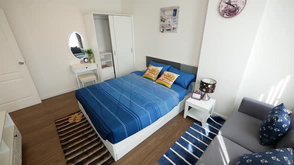 Simple and Stylish Bedroom Decoration Idea With Sofa and Dressing Table alt