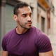 Handsome muscular man looking confident while walking down the narrow street - PhotoDune Item for Sale