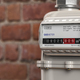Natural gas meter  on brick  wall. - PhotoDune Item for Sale