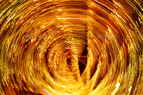 Bright abstraction from bokeh garland, Long exposure. Festive golden background