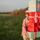Woman carries New Year&#39;s gifts outdoors - PhotoDune Item for Sale