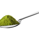 Teaspoon with green matcha tea powder isolated on white. - PhotoDune Item for Sale