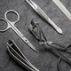 Manicure and pedicure tools on black background. - PhotoDune Item for Sale