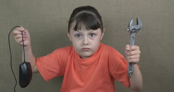 Child with wrench.  alt