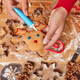 Overhead shot of unrecognizable person decorates reindeer ginger cookie prepares delicious tradition - PhotoDune Item for Sale