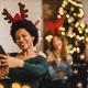 Multiracial Group Of Female Friends Taking Selfie Near Christmas Tree - PhotoDune Item for Sale
