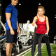Young couples work out at the gym to strengthen the body. - PhotoDune Item for Sale