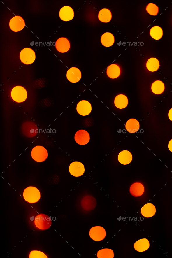 Gold round bokeh lights of a Christmas holiday garland Stock Photo by