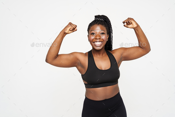 Portrait of Young Fitness Woman Shows Biceps Stock Image - Image