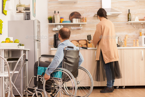 Man with walking handicap - Stock Photo - Images