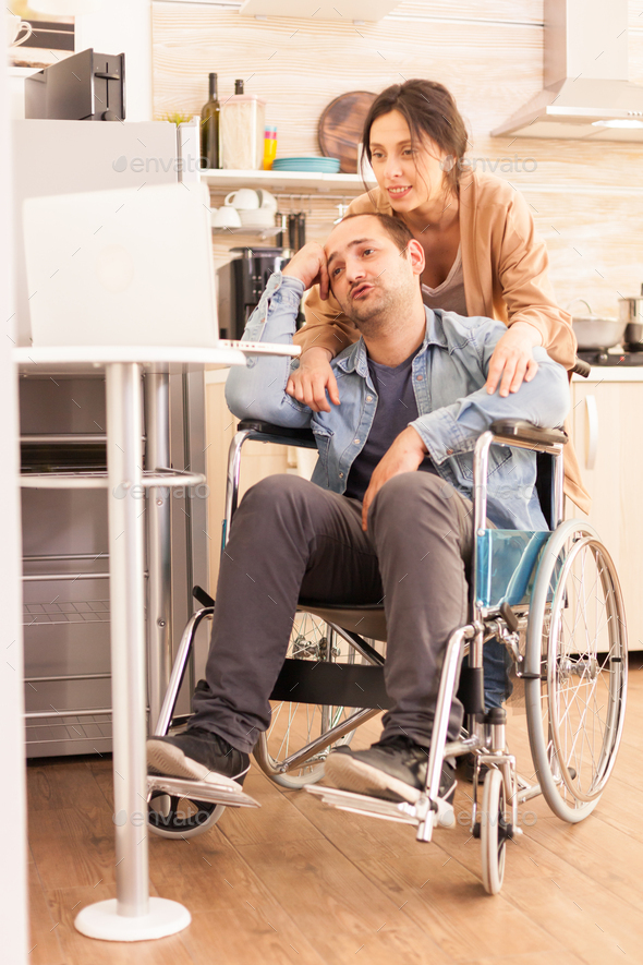Handicapped man in wheelchair - Stock Photo - Images