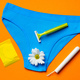 Women&#39;s panties with sanitary tampon on color background - PhotoDune Item for Sale