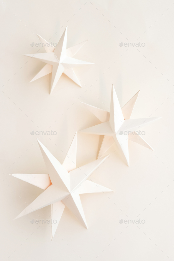 Merry Christmas.Christmas stars handmade light beige background.Monochrome,Christmas background - Stock Photo - Images