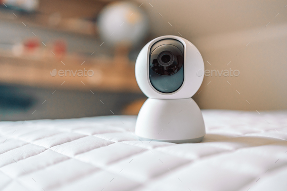 Video surveillance equipment at home. Compact security camera for outdoor or private home security - Stock Photo - Images