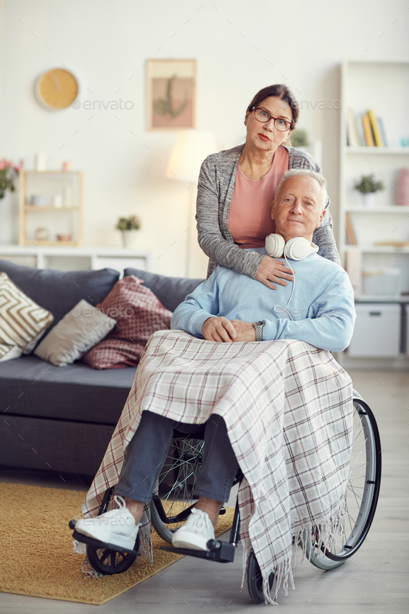 Portrait of wife and her disabled husband