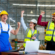 Group of Asian warehouse worker raise hands and action of happy from success in their project - PhotoDune Item for Sale