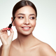 Beauty woman applying black mascara on eyelashes - PhotoDune Item for Sale