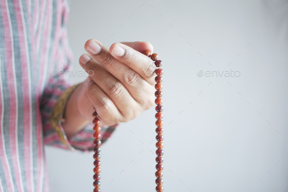 muslim man keep hand in praying gestures during ramadan, Close up Stock ...