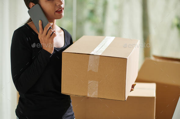 Woman Calling to Moving Company