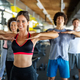 Group of young fit people, friends doing exercises in gym to stay healthy. Sport, people concept. - PhotoDune Item for Sale