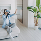 Handicapped girl with cyber arm in vr glasses at home. Technology for recovery and rehabilitation. - PhotoDune Item for Sale