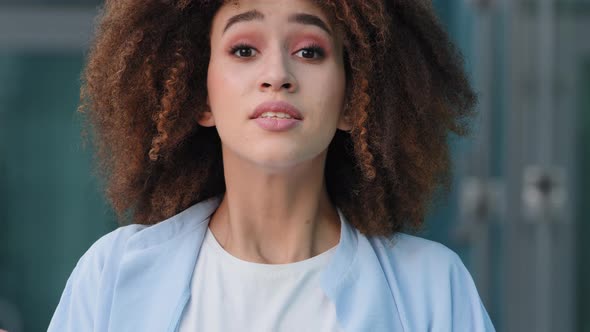 Female Portrait Outdoors African American Girl Ethnic Black Afro Woman Looking at Camera Waiting alt