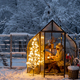 Snowy yard with glasshouse and glowing tree graland - PhotoDune Item for Sale