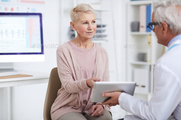 Asking doctor about prescribed pills - Stock Photo - Images