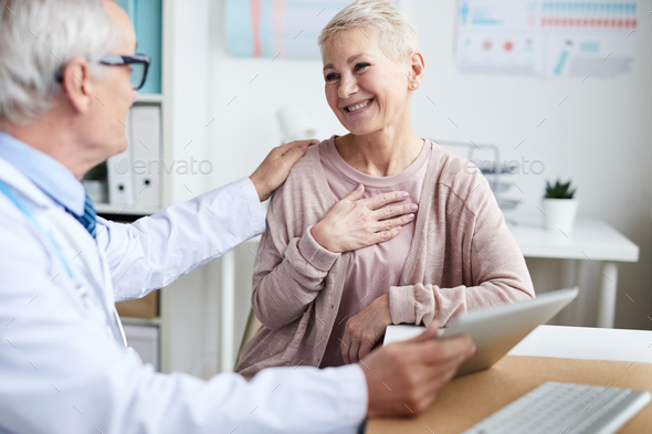 Reporting good tests results to patient - Stock Photo - Images