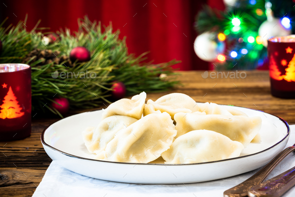 Traditional Polish Christmas Eve food on festive table - Stock Photo - Images
