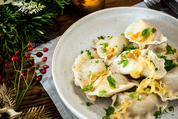Traditional Polish Christmas Eve food on festive table - Stock Photo - Images