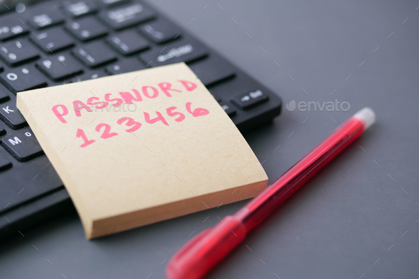 writing password on a sticky note  - Stock Photo - Images