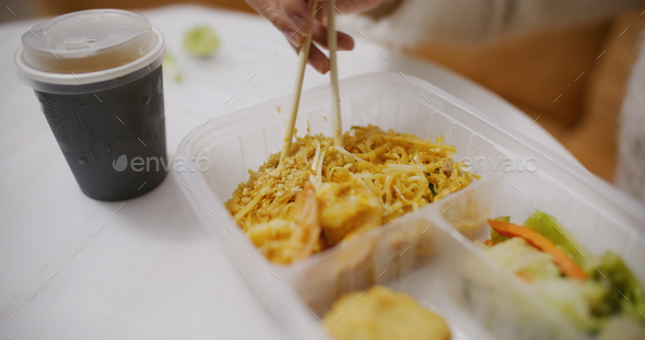 Take away box with thai cuisine, fry rices