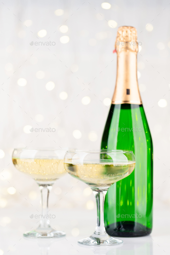 Champagne bottle and glasses Stock Photo by karandaev PhotoDune