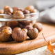 Peeled chestnuts. Sweet roasted chestnuts on cutting board. - PhotoDune Item for Sale