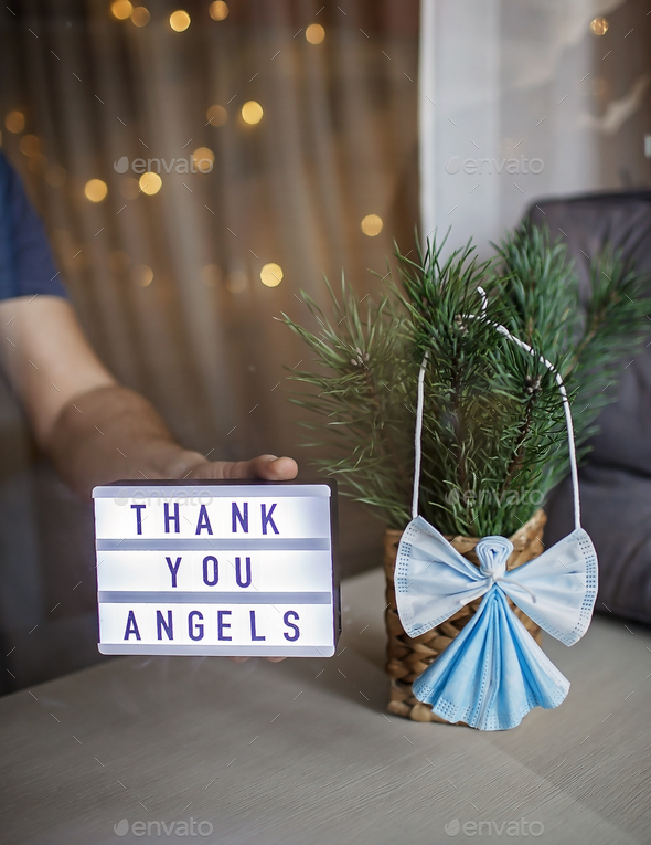 DIY angel made with medical masks, zero waste decor, gratitude from thankful patient