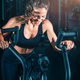 Woman Exercising on Air Bike in the Gym. - PhotoDune Item for Sale