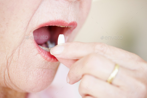 Something for the symptoms - Senior Healthcare - Stock Photo - Images