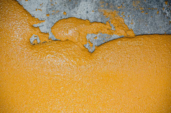Selective focus on the yellow floor of freshly applied epoxy mortar system